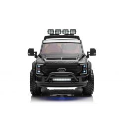 Jouet porteur électrique Duty Car Duty 24V noir, Deux places, Entraînement 4X4 avec moteurs et suspension 24V haute performance, Deux roues arrière en EVA, Siège en similicuir, Télécommande 2,4 GHz, Rampe d'éclairage LED, Lecteur MP3 avec entrée USB