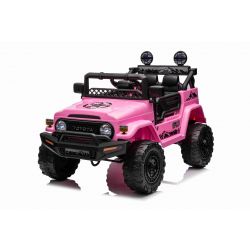 Voiture électrique enfant TOYOTA FJ CRUISER avec traction arrière, Rose, Batterie 12V, Châssis haut, Siège large, Suspension d'essieu arrière, Lumières LED, Télécommande 2,4 GHz, Lecteur MP3 avec entrée USB/AUX, Licence